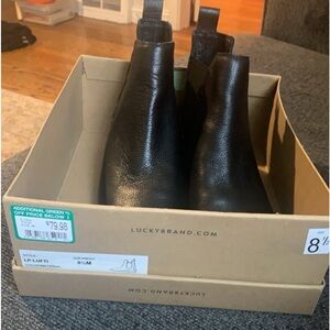 Never worn black boots